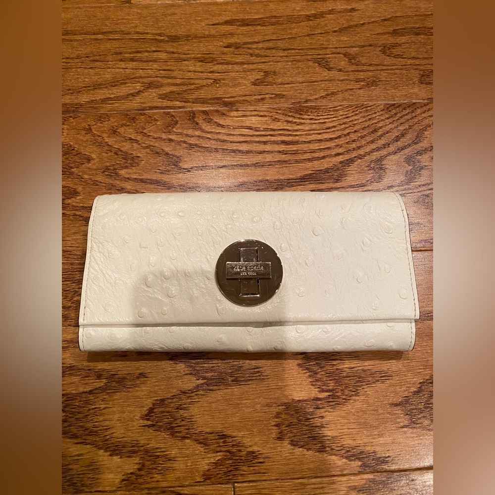 Kate Spade Ostrich embossed twist lock ivory color wallet  NWOT